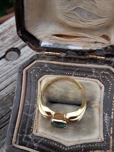 Beautiful 18k Yellow Gold, Approximately 1ct Cushion Cut Colombian Emerald, Diamond Baguette ring.. all sales are final. Weight is 5.5 Grams. Size 7 3/4.. Very Good Pre Owned Vintage Condition.. Ring Guard is NOT INCLUDED, just to show some ideas.. some pics ENLARGED to see details. Antique Box for Display only. Heirloom Emerald Ring Baguette Cut, Heirloom Style Baguette Cut Emerald Ring, Heirloom Baguette Cut Emerald Ring, Classic Yellow Gold Emerald Wedding Jewelry, Heirloom Emerald Diamond Ring For Formal Events, Emerald Baguette Cut Ring For Promise, 14k Gold Emerald Cut Emerald Ring For Wedding, Classic Gold Emerald Wedding Ring, Formal Bezel-set Baguette-cut Emerald Ring