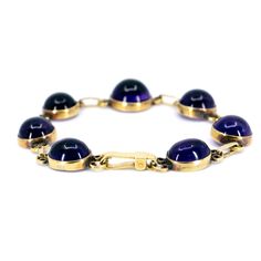 This mesmerizing link bracelet feature cabochon-cut ±30.00ct Amethyst crafted in 18ct. Design Era: Mid-Victorian (1856-1880)., sizeable (within reason). Dimensions: L 19 cm x W 1.5 cm.. Weight in grams: 19.6. Condition: Very good condition - slightly used with small signs of wear. Resizing possible (contact seller for information). Registered Shipping or Local Pickup at our store (in case of Local Pickup; shipping cost if applicable will be refunded). Looking for more antiques & vintage jewe Formal Purple Oval Cabochon Jewelry, Formal Amethyst Oval Cabochon Jewelry, Formal Amethyst Jewelry, Oval Cabochon, Classic Cabochon Bracelets As Gift, Classic Cabochon Bracelets For Gifts, Formal Cabochon Bracelet Jewelry, Antique Oval Link Bracelet For Formal Occasions, Oval Cabochon Bracelets For Formal Occasions, Formal Amethyst Jewelry With Polished Finish