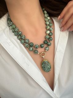 Adorn yourself or a loved one with the natural beauty of our Moss Agate Necklace. This exquisite green gemstone jewelry for women is meticulously handmade, creating a truly unique piece. Whether it's a special anniversary or a memorable birthday, this beaded necklace serves as a meaningful and timeless gift. The verdant hues of moss agate blend seamlessly, offering an elegant touch to any outfit. Make every occasion special with this handcrafted accessory that captures the essence of nature's be Handmade Anniversary Gifts, Moss Agate Necklace, Handmade Crystal Necklace, Aventurine Necklace, Unique Birthday Gift, Chunky Statement Necklace, Handcrafted Accessories, Necklace Green, Anniversary Gifts For Wife