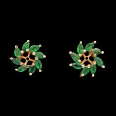 A pair of 14k yellow gold marquise cut Emerald earring jackets. SE1385 Weight: 2.40 grams Emeralds (16) Marquise Cut Stone Measurements: 3.83 x 2.40 mm - approximate Emerald Earring, Diamond Flower Pendant, Opal Diamond Ring, Diamond Heart Pendant Necklace, Earring Jackets, Opal Ring Gold, Cabochon Ring, Heart Pendant Diamond, Flower Pendant Necklace