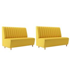 two yellow couches sitting next to each other