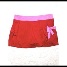 Adorable And Never Worn Fila Tulip Tennis Skirt In Red/Pink. Shorts Attached. Size M Summer Beach Swim Skirt With Pockets, Beach Skirt With Pockets And Stretch Fit, Stretch Skirt With Pockets For The Beach, Pink Skirted Skort With Pockets, Stretchable Pink Skirt For Vacation, Pink Stretch Skirt For Vacation, Stretch Pink Skirt For Vacation, Pink Stretch Skort For Vacation, Beach Skort With Stretch And Pockets