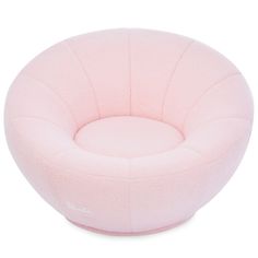 a pink round chair sitting on top of a white floor