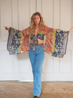 SILK BELL SLEEVE CROP TOP - RAINBOW FIRE SKY ** LIMITED PRINT AVAILABLE **  Handmade recycled silk crop kimono with amazing billowing bell sleeves and gold printed fabric! The gold shimmers and shines, the photos don't do it justice!  This incredible silk crop top is the perfect addition to any outfit, with flowing sleeves and bohemian vibe, this is an amazing bespoke piece to add to any wardrobe!  Our 'Bella' tops were dreamed up in the sunshine and are a twist on our classic 'Stevie' tops and Vintage V-neck Top With Boho Print, Vintage Boho Print V-neck Top, Festival Boho Print Rayon Blouse, Multicolor Cropped Bohemian Tops, Bohemian Blouse With Vintage Print For Spring, Bohemian Multicolor Blouse With Vintage Print, Bohemian Multicolor Cropped Tops, Hippie Rayon Tops For Festival, Hippie Style Rayon Festival Tops