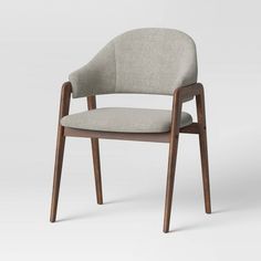 an upholstered chair with a wooden frame and fabric seat, viewed from the front