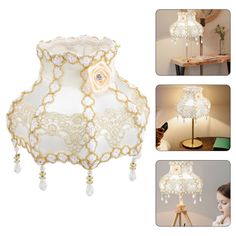 the lamp is decorated with white flowers and pearls on it's sides, along with other details