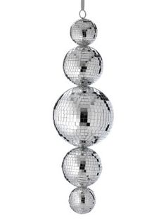 three silver disco balls hanging from the ceiling