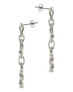 You don't want to blend in, and these bold drop earrings will help you stand out! These feature a trio of organic molten links that secure with a sturdy post back. Available in gold and silver tones. Materials: 14K gold or rhodium plated brass Features: 2" drop, 0.45" width, 0.4" stud, Lead & Nickel free, post back Modern Earrings With Polished Oval Link, Modern Oval Link Earrings With Polished Finish, Modern Sterling Silver Link Earrings, Modern Sterling Silver Tarnish Resistant Linear Earrings, Modern Sterling Silver Tarnish-resistant Linear Earrings, Modern Tarnish Resistant Sterling Silver Linear Earrings, Modern Tarnish-resistant Sterling Silver Linear Earrings, Modern Link Earrings With Hooks, Modern Dangle Earrings With Hook And Links