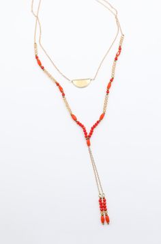 Bring some double the fun to your look with this dual-hued necklace! Featuring a mix of orange and champagne beads, you'll be striking a balance between sassy and chic! Wear with your favorite summer dress for a playful pop of color.Details: Fine Gold Chain Double Strand Necklace Orange and Champagne Colored Beads Length: 16" Extension: 2" Beads: 3mm - 4mm Orange Multi-strand Jewelry For The Beach, Orange Multi-strand Jewelry For Beach, Summer Necklaces With Dangling Round Beads, Summer Party Long Necklaces, Orange Multi-strand Beaded Necklaces For Beach, Summer Red Necklace With Beaded Chain, Orange Beaded Necklaces For Beach, Red Beaded Necklaces For Summer, Colorful Multi-strand Beaded Necklaces For Summer