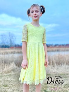 A new addition to our twirly lace collection. So soft and fully lined with our regular dress material. This pastel yellow dress has half sleeves and of course pockets! Fitted Lace Dress For Dress-up In Spring, Spring A-line Dress For Confirmation, Spring Lace Dress With Lace Bodice For Dress-up, Spring Lace Dress With Lace Trim For Dress-up, Spring Confirmation Lace Dress, Spring Flowy Scalloped Lace Dress, Spring Flowy Dress With Scalloped Lace, Flowy Scalloped Lace Dresses For Spring, Spring Lace Dress For Confirmation