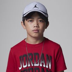 Featuring an embroidered Jumpman logo and cord trim, this is the classic trucker hat, Jordan style. The 6-panel construction features a poly mesh front with 4 breathable mesh panels. The snapback closure helps you get a fit that's just right and the semi-curved brim and built-in cotton sweatband help your head stay cool and comfy while you're out under the sun. Jordan Style, Jumpman Logo, Stay Cool, Your Head, Big Kids, Trucker Hat, The Sun, Jordan, Built In