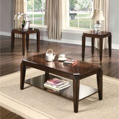 a coffee table and end tables in a living room