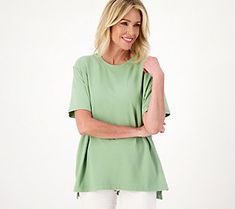 The comfy tee of your dreams, this oversized tunic style is your go-to pick for cozying up on the couch or sitting on the porch in the morning with a cup of coffee. From Cuddl Duds. Cozy Short Sleeve Summer Tops, Green Relaxed T-shirt For Loungewear, Comfy Spring Tops, Comfy Solid Color Spring Tops, Oversized Comfortable Spring Tops, Oversized Comfortable Tops For Spring, Cozy Cotton Tops For Casual Gatherings, Comfortable Short Sleeve Tops For Fall, Comfortable Tops For Everyday Spring Wear