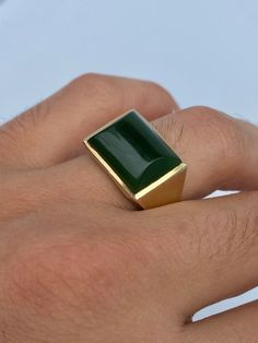 "Pacific Jewelry Presents, Vintage Nephrite Jade ring, circa 1980's. Gorgeous rectangular 12 carat center stone mounted in heavy 14k gold brushed finish. One of the oldest gemstones known to man, Jade is a prized gemstone with metaphysical properties across various cultures. Made with 14k solid yellow gold, this ring was handcrafted over 30 years ago by jewelers in the United States (stamped 14k). <> ✔ Natural, genuine Nephrite Jade ✔ Setting: Tension set ✔ Brushed Gold Finish ✔ 14k Solid Jade Ring Men, Mens Gold Ring, Gold Mens Ring, Yellow Gold Mens Rings, Mens Gold Rings, Men Wear, Nephrite Jade, Etsy Gold Ring, Square Earrings Studs