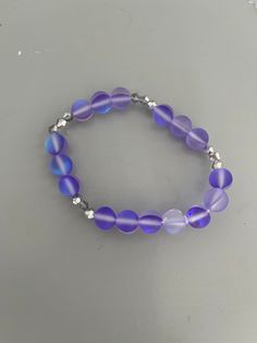 Lilac homemade bracelet Purple Diy Bracelet, Casual Purple Hypoallergenic Bracelets, Handmade Purple Stretch Bracelet, Casual Handmade Lavender Jewelry, Casual Purple Handmade Bracelets, Casual Purple Bracelets With Colorful Beads, Casual Handmade Purple Bracelets, Handmade Casual Purple Bracelets, Casual Purple Hypoallergenic Jewelry