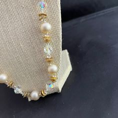 This listing is for a beautiful necklace by Vendome.  The necklace is made with gold metal discs, cream glass pearls, and clear faceted glass beads. Size:  Approximately 24" in length Condition:  Good condition for being vintage Want to purchase 3 or more items from my shop?  Please use the following coupon when you check out to receive 20% off! https://www.etsy.com/shop/elsysvintage?coupon=ELSYSDISCOUNT *Please be aware the items I am selling are vintage, which means they are old and with anyth Vintage Round Beaded Crystal Necklaces, Vintage Beaded Round Crystal Necklaces, Vintage Beaded Crystal Necklaces, Beaded Pearl Crystal Necklace For Party, Pearl Beaded Crystal Necklace For Party, Party Pearl Beaded Crystal Necklace, Vintage Beaded Pearl Necklace For Party, Vintage Adjustable Pearl Necklace With Round Beads, Adjustable Vintage Pearl Necklace With Round Beads