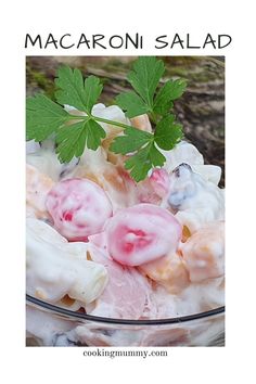 a close up of food in a bowl with leaves on the top and text overlay that reads macaroni salad