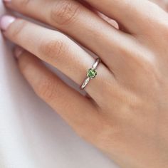 Capture that special someone's love of nature with this green beauty. This lovely ring is expertly made in white gold with a glowing moldavite. #klenota #klenotajewelry #klenotaring #ring #gold #14k #14carat #engagement #jewelrymakers #moldavite #engagement2020 #moldavites #czechmoldavite #czechrepublic #olivegreen #greengemstone #greenjewelry #forestgreen #gemstone #whitegold #goldandgreen #greenandgold #proposal #giftforher #anniversary #inspiration #shesaidyes #couplegoals #prague #czechstone May Month, Engagement Design, Moldavite Ring, Classic Diamond Ring, Engagement Ring Gold, Natural Emerald Rings, Classic Engagement, Green Jewelry, Lovely Ring