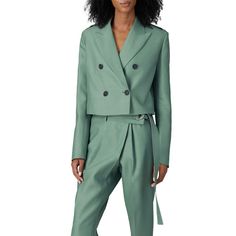 Green wool (71% Virgin Wool, 29% Silk). Jacket. Long sleeves. Exposed font button closure. 20.5" from shoulder to hemline. Imported. Shown here with SCHUTZ Shoes. Semi-formal Tailored Cropped Jacket With Long Sleeves, Tailored Cropped Jacket For Semi-formal Occasions, Semi-formal Spring Cropped Jacket With Suit Collar, Semi-formal Cropped Jacket With Suit Collar For Spring, Spring Semi-formal Cropped Jacket With Suit Collar, Fall Semi-formal Single-breasted Cropped Jacket, Tailored Long Sleeve Cropped Jacket For Business, Fitted Wool Cropped Jacket For Spring, Cropped Wool Outerwear For Work