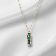 Discover the beauty and elegance of our Emerald and Diamond Necklace. Made with 14k yellow gold, this necklace features stunning emeralds and 0.10ct diamond, adding a touch of luxury to any outfit. The 16-18" chain is secured with a spring ring clasp for ease and comfort. Elevate your style with this timeless piece. Emerald And Diamond Necklace, Sterling Silver Jewelry Earrings, Charm Rings, Chains For Men, Birthstone Jewelry, Ring Bracelet, Spring Rings, Gold Bands, Timeless Pieces