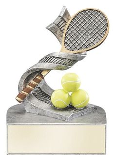 a trophy with tennis balls and a racket on it's side, in front of a white background