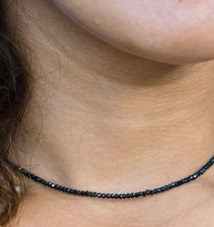 Let it be the new staple in your jewelry collection. This very sparkly 2mm black spinel choker goes basically with every necklace and makes layering a little bit more interesting. Necklace is 14', extender 2 1/2' Layer this necklace with: https://www.etsy.com/listing/548559512/diamond-heart-charm-necklace-pave?ref=shop_home_active_1 or: https://www.etsy.com/listing/524658680/pave-diamond-enamel-star-pave-diamonds?ref=shop_home_active_23 Check OliverRafCollection for new listings: https://www.ets Interesting Necklace, Black Spinel Necklace, Spinel Necklace, Necklace Minimalist Jewelry, Necklace Layering, Everyday Necklace, Necklace Minimalist, Necklace Beaded, Black Spinel