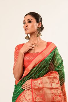 Elevate your ethnic elegance with our exquisite Green Mangalagiri Cotton Silk Zari CheckSaree. This saree featuring a striking red border reflects traditional craftsmanship and modern style. Designer Red Paithani Silk Pre-draped Saree, Red Cotton Silk Pre-draped Saree With Dupatta, Red Cotton Silk Choli With Traditional Drape, Designer Red Cotton Silk Choli, Traditional Red Cotton Silk Choli, Red Cotton Silk Pre-draped Saree For Designer Wear, Red Cotton Silk Pre-draped Saree With Cutdana, Elegant Handloom Red Pre-draped Saree, Elegant Red Handloom Pre-draped Saree