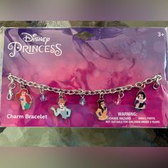 disney princess charm bracelet with charms in the shape of pooh, ariel and flounds