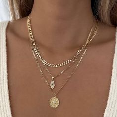 Gorgeous Hamsa necklace with encrusted cubic zirconia details. Perfect to wear alone or layer with other necklaces. 14k Gold Filled Chain 14k Gold Filled Charm Charm: 14.6mm x 7.9mm Chain length: 18" Chain Diameter: 2.5mm Lobster clasp closure Hypoallergenic Water resistant & tarnish free Nickel & lead free Layering Gold Necklaces, Layered Necklaces Gold, Necklace With Charms, Stackable Necklaces, Hamsa Necklace, Stacked Necklaces, Pendant Necklace Gold, Jewelry Fashion Trends, Jewelry Essentials