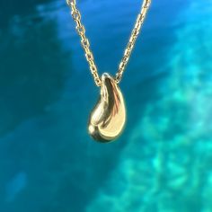 Showcase you love of water with our stunning and modern Wai Raindrop pendant. Water is life in Hawaii and this beautifully designed pendant is sure to add elegance and sophistication to any outfit. .925 Sterling Silver Approx. 1/2" Tall Available in 14K Gold Plated or Silver Includes 18" Adjustable chain w/1" extension Everyday Teardrop Jewelry With Shiny Finish, Teardrop Shaped Jewelry With Shiny Finish For Anniversary, White Gold Teardrop Jewelry With Shiny Finish, Tarnish Resistant White Gold Drop Jewelry, Tarnish-resistant White Gold Drop Jewelry, White Gold Tarnish-resistant Drop Jewelry, Tarnish Resistant Drop Jewelry For Anniversary, Drop Shaped Jewelry With Shiny Finish For Gifts, Modern White Gold Drop Necklaces