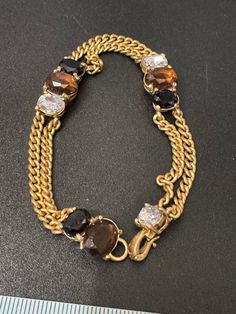 Vintage designer MONET signed gold tone brown black clear diamanté rhinestone Matt antique gold tone chain bracelet 19cm Luxury Brown Hand-strung Jewelry, Vintage Designer, Chain Link Bracelet, Link Bracelets, Chain Bracelet, Antique Gold, Chain Link, Vintage Designs, Jewelry Bracelets