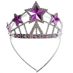 a tiara with purple and silver stars on the top, sitting in front of a white background