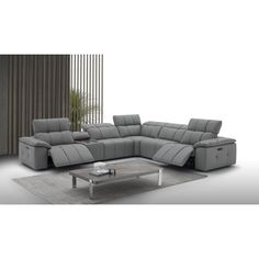 a grey sectional sofa with recliners and coffee table