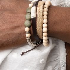 Mismatched Strands Of White Wooden Beads, Green Stones, And Silver Beads Join A Brown Leather Band And Braided Strand Of Twine Around The Wrist, Resulting In Earthy Layers. Features An Adjustable Sliding Knot Closure. Sold As One Individual Bracelet. Casual Cream Beaded Jewelry, Casual White Jewelry With Wooden Beads, Wooden Beaded Bracelets, Adjustable Sliding Knot, Curated Closet, Green Bracelet, Brown Leather Bracelet, Board Inspiration, Green Stones