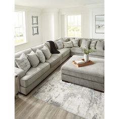 a large sectional couch in a living room