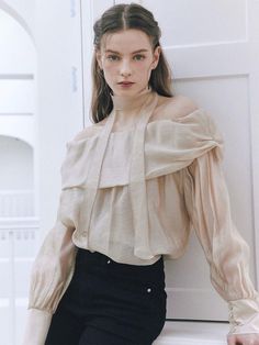 Romantic mood off-shoulder blouse that made of glittery and soft see-through material. The off-shoulder design has elasticity that fits various sizes and body shapes. The shirring detail and bean buttons at cuffs also accentuated the feminine mood. The scarf that made of the same fabric can be styled in many ways. Style with skirts, denim jeans, or maxi skirt to create romantic looks. - Banding off-shoulder design that fits various sizes- Shirring and draping detail at both sides- Four-button barrel cuffs- Scarf that can be tied in many ways- Glittery, wrinkle, see-through fabric that has elasticity and soft texture Scarf Blouse, Skirts Denim, Romantic Mood, Romantic Look, Shoulder Design, Soft Texture, Body Shapes, Off Shoulder Blouse, Maxi Skirt