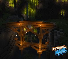 a small bridge in the middle of a forest at night with lights on it's sides