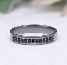 The design can be made with other gemstones as well. If you would prefer a custom ring, please contact us before purchase. Details RG8959 Main stone: black onyx, 1.50 mm Material: 925 Sizes available: 4-12 (Larger and smaller sizes are available as well. Priced upon request. Band Width: 4.00 mm Procedure information Please select the ring size and material from the drop-down menu. If you have any special requests or questions, please do not hesitate to contact us. Stacking Bands, Custom Ring, Onyx Gemstone, Black Rhodium, Engagement Wedding, Custom Rings, Black Onyx, Ring Verlobung, For Love