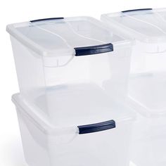 three plastic storage containers with lids and handles