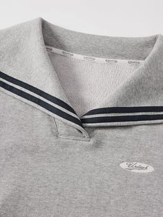 Details: Quiet grey tone navy collar sweatshirt. Embroidery design on the chest, delicate stitching, three-dimensional and delicate Short boxy fit with high-waisted trousers, visually lengthening the proportion. Materials & Care: Polyester 57.4 %, Cotton 33.7%, Viscose 7.4%, Spandex 1.5% Hand wash | Dry clean Do not bleach Size & Fit: Model is 5'7", Bust 32, Waist 24, Hips 35, wearing a size S Item #: JN1SW18 Collar Sweatshirt, Sweatshirt Embroidery, Chic Business Casual, Denim Jean Dress, Collared Sweatshirt, Grey Tones, High Waisted Trousers, Shirt Sale, Mens Polo Shirts