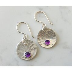 The Amethyst Silver Disc Earrings Have Been Created By Hand From Sterling Silver Sheet, Fine Silver Bezels And Amethyst Cabochons. I Hammered The Discs To Add Texture And Soldered The Bezel Cups Before Setting The Deep Purple Amethyst Cabochons. The Discs Measure 17mm And Dangle An Inch From The Ear. Handmade Earrings Silver, Silver Sterling Silver Earrings With Round Stone, Nickel-free Silver Amethyst Jewelry, Silver Gemstone Round Stone Earrings, Silver Gemstone Earrings With Round Stones, Silver Amethyst Gemstone Earrings, Sterling Silver Earrings With Round Birthstone, Silver Amethyst Earrings For Anniversary, Nickel-free Amethyst Earrings For Anniversary