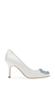 On your special day, this satin bridal pump handcrafted in Italy offers a glamorous bit of 'something blue' with the dazzling crystal buckle at the toe. 3 1/2" (89mm) heel (size 8.5) Textile upper/leather lining and sole Made in Italy Women's Designer Shoes Elegant Embellished Shoe Clips For Wedding, Elegant Pearl-embellished Wedding Shoes For Evening, Glamorous Pearl-embellished Wedding Shoes For Formal Occasions, Luxury Wedding Heels With Sculpted Heel, Elegant Pearl Embellished Wedding Shoes For Reception, Luxury Low Heel Wedding Heels, Elegant Low Heel Crystal Embellished Heels, Silver Heels With Sculpted Heel For Wedding, Silver Sculpted Heel Wedding Shoes