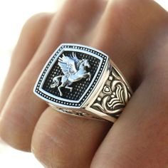 Check out this vintage Pegasus signet ring!




 If you are looking for a unique and sophisticated vintage piece, this Vintage Signet Ring for Men is for you. Made of high quality stainless steel, this signet ring features a unique and classic design that will turn heads. The shape of the winged horse , a symbol of Greek mythology, is engraved on the top, making this ring even more sophisticated. Treat yourself or your loved one to a timeless retro style with this beautiful Pegasus signet ring .



 Matter : Zinc alloy



 Unique model


 High quality finish




 Free Shipping 






 ✂ SIZE GUIDE 




















 Size


 Circumference (mm) 






 5

 49.3 






 6

 51.9 






 7

 54.4 






 8

 57 






 9

 59.5 






 10

 62.1 






 11

 64.6 






 12

 67.2 Horse Socks, Horse Backpack, Horse Keychain, Unicorn Wings, Horse Hair Jewelry, Horseshoe Jewelry, Horse Ring, Horse Bracelet, Winged Horse