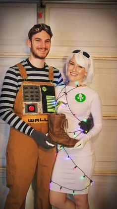 a man and woman dressed up in costumes