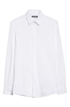 Channel a trim, tailored aesthetic in this cotton button-up shirt that features a crisp point collar and long sleeves. 30 1/2" length (size 40) Front button closure Point collar Long sleeves with button cuffs 100% cotton Dry clean or machine wash, line dry Made in Italy Men's Designer Clothing White Cotton Shirt With Concealed Placket, Timeless Cotton Dress Shirt, Office Cotton Shirt With Lapel Collar, Modern Cotton Dress Shirt With Concealed Placket, Modern Dress Shirt With Spread Collar For Daywear, White Cotton Dress Shirt With Fold-down Collar, Business Casual Slim Fit Dress Shirt With Collar, Slim Fit Dress Shirt For Business Casual, Long Sleeve Cotton Dress Shirt For Daywear