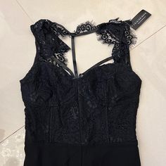 I Jumpsuit With Lace Top. Zip Up Back. Sleeveless Lined Jumpsuits And Rompers For Party, Black Jumpsuits And Rompers With Lined Body For Party, Black Lined Jumpsuits And Rompers For Party, Elegant Black Jumpsuits And Rompers With Lined Body, Black Jumpsuit With Lined Body For Party, Black Party Jumpsuits And Rompers With Lined Body, Black Party Jumpsuit With Lined Body, Black Sleeveless Bodysuit For Evening, Black Sleeveless Jumpsuits And Rompers With Lined Body