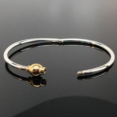 "This sterling silver Eternity Bangle is hinged to easily slip on the wrist. It features a threaded bead which completes the circle of eternity. The bangle can accommodate medium and large spacer beads, European style charm-beads, and traditional charms. Available in both sterling silver, and sterling silver with 14k gold vermeil. \"Sterling\" is inscribed on the inside of the band. Available in extra small, small, medium, and large. Extra small tends to fit a preschool girl or boy. Extra Small Adjustable Bangle Bracelet With Box Clasp, Adjustable Bangle Bracelets With Box Clasp, Silver Bangle Bracelet With Clasp, Flamingo Necklace, Modern Bracelet, Preschool Girl, Bracelet Stacking, Bangle Silver, Modern Bracelets