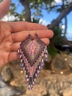 This beautiful pair of boho style earrings with different shades of purple, pink, brown and beige seed beads will bring out the hippie in you! So lightweight and flowy and are perfect for day to day or for any perfect occasion. gift for yourself or for your purple loving friend! Handmade with love using Toho seed beads, each pair is made to order. Approximate measuring: length- 4" width- 0.9" Ear wire is iron and nickel free Purple Beaded Earrings, Measuring Length, Beadwork Earrings, Boho Style Earrings, Purple Beaded, Brown And Beige, Earrings Boho, Boho Stil, Style Earrings