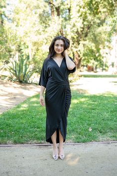 Indulge in luxury with our Graceful Evening Dress. Made from stretchy fabric and featuring a ruched stomach area, V-neck, and drapery sleeves, this maxi length dress will elevate your evening with grace and sophistication. Embrace a stunning silhouette and effortless style. Color: Black Fabric: 90% Polyester, 10% Spandex Runs true to size Color may vary based on lighting Size chart Bust Measurements S = 36-38" M = 38-42" L = 40-44" Waist Measurements (No stretch to full stretch) S = 28 - 32" M = Stretchy Fabric, Black Fabric, Dress Collection, Evening Dress, Effortless Style, Dress Length, Evening Dresses, Size Chart, Spandex