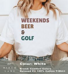 What is better than Weekends Beer and Golf?  This cozy tee features the words "Weekends Beer and Golf" in a playful retro font pairing, direct to garment printed on a comfortable fit, crewneck tshirt that fits like a well-loved favorite.  We have tons of cute designs in our shop, check them out here! https://onbirchlane.etsy.com Made To Order ------> Please allow sufficient time for production and shipping by referring to our current lead times below this description. Quality Printing  ------> D Sporty Graphic Print Tops For The Weekend, Weekend Graphic Tee With Crew Neck, Weekend Crew Neck T-shirt With Letter Print, Weekend Letter Print Crew Neck T-shirt, Sporty Letter Print Tops For Weekend, Sporty Weekend Tops With Letter Print, Sporty Tops With Letter Print For Weekend, Sporty Cotton Tops With Letter Print For Weekend, White Letter Print Golf Tops